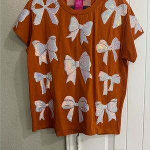Queen of sparkle Orange Short-Sleeve Tee with Iridescent Bow Appliqués